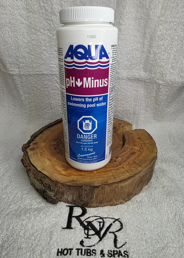 Aqua pH Minus tube on a wooden block with a gray background