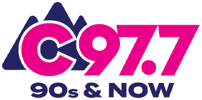 C97.7