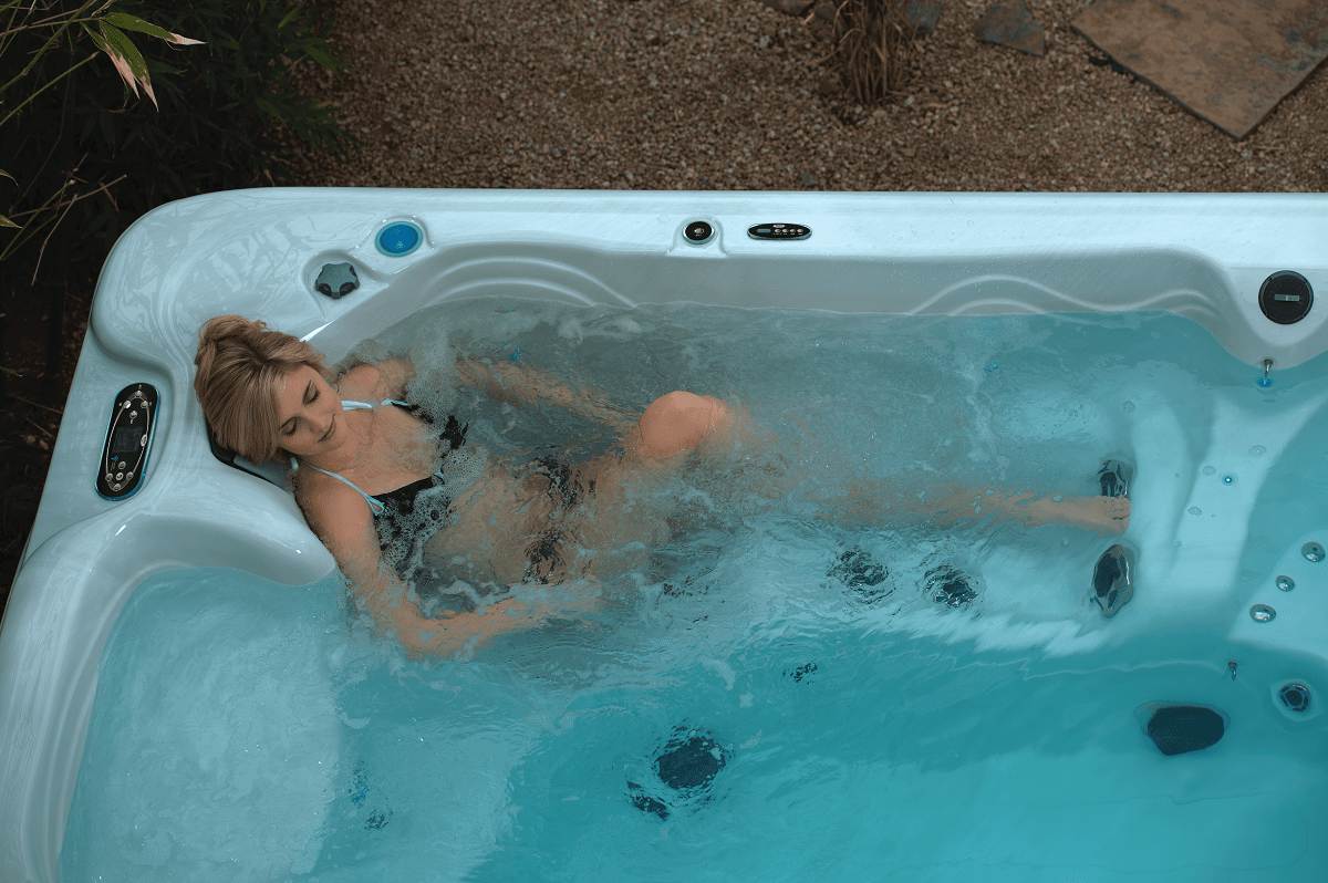 Can a Soak in a Hot Tub Help You Sleep? - RnR Hot Tubs - Hot Tubs and Spas - Featured Image