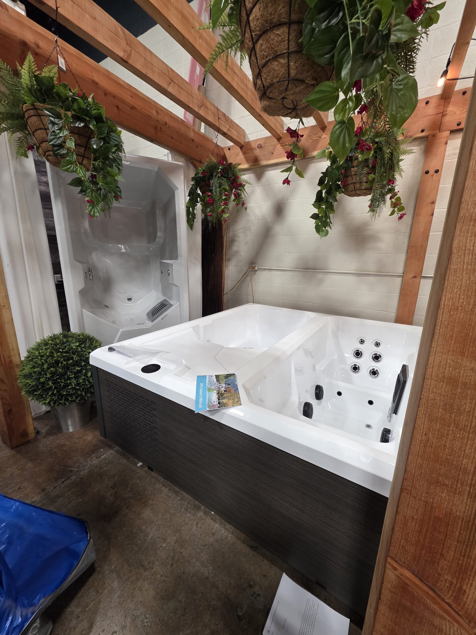 Cold water therapy. A cold plunge underneath a gazebo at RnR Hot Tubs and Spas